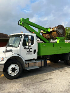 A photo of a truck belonging to Quick Compact, providing quality dumpster compaction services in Houston Texas, spring texas, the woodlands texas, katy texas